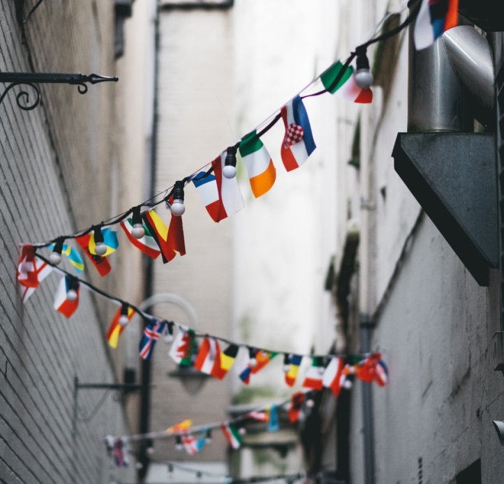 Bunting of international flags in an alley