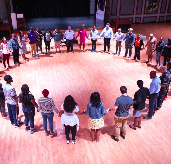 Students standing in a circle