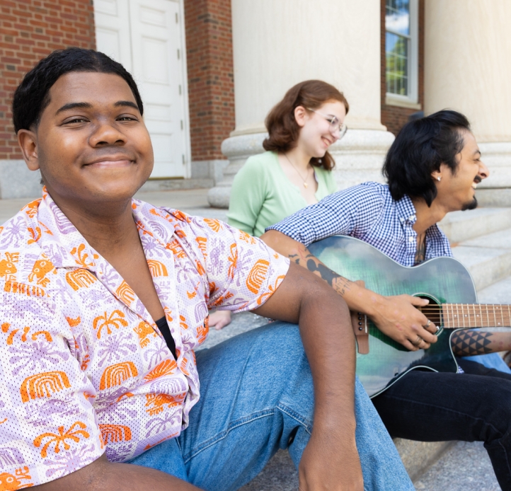 Students sit outside Rockwell Hall