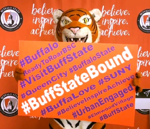 Bengal mascot holding a #BuffStateBound sign.