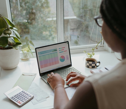 Student types on laptop