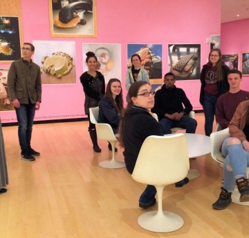 Honors students in an art gallery