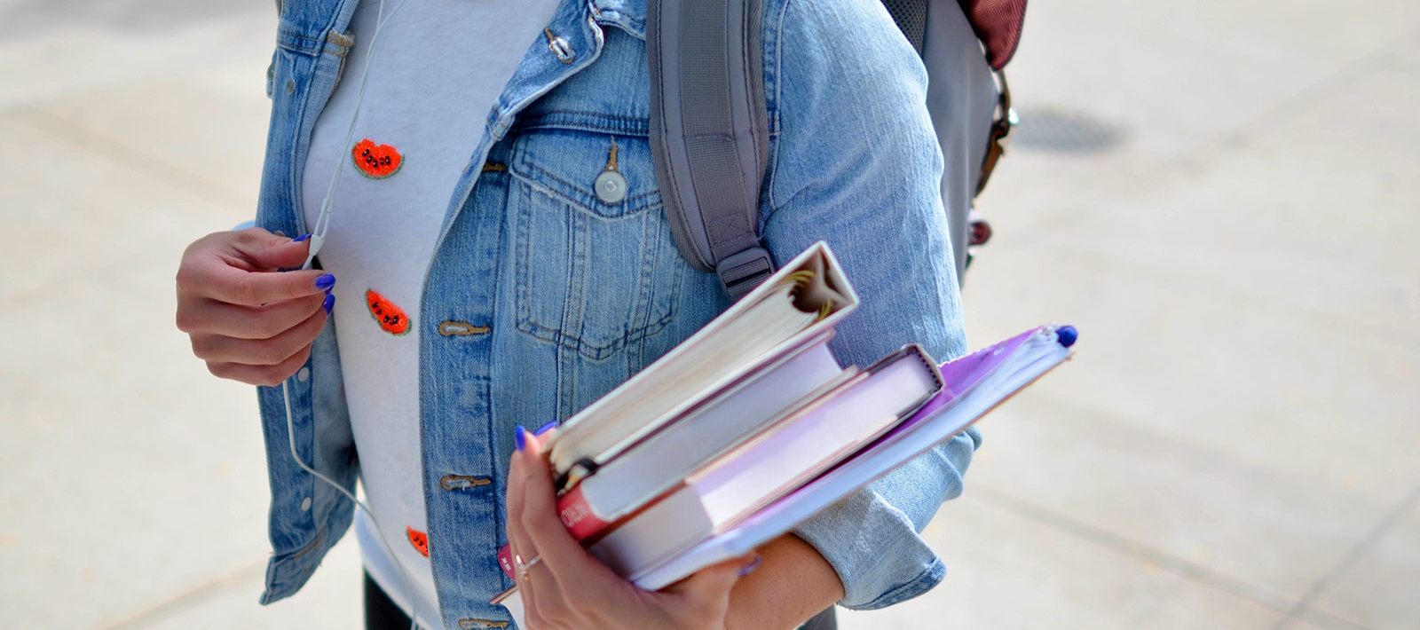 Student holding books