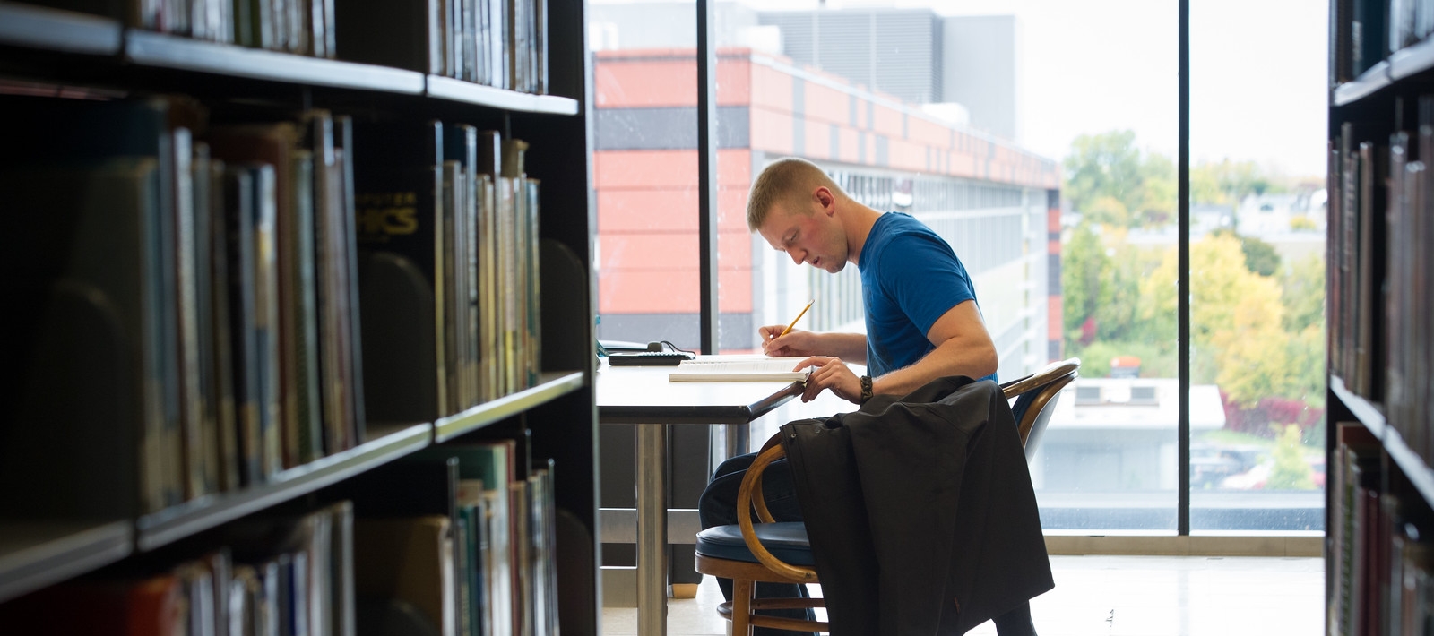 Student at desk in E. H. Butler Library