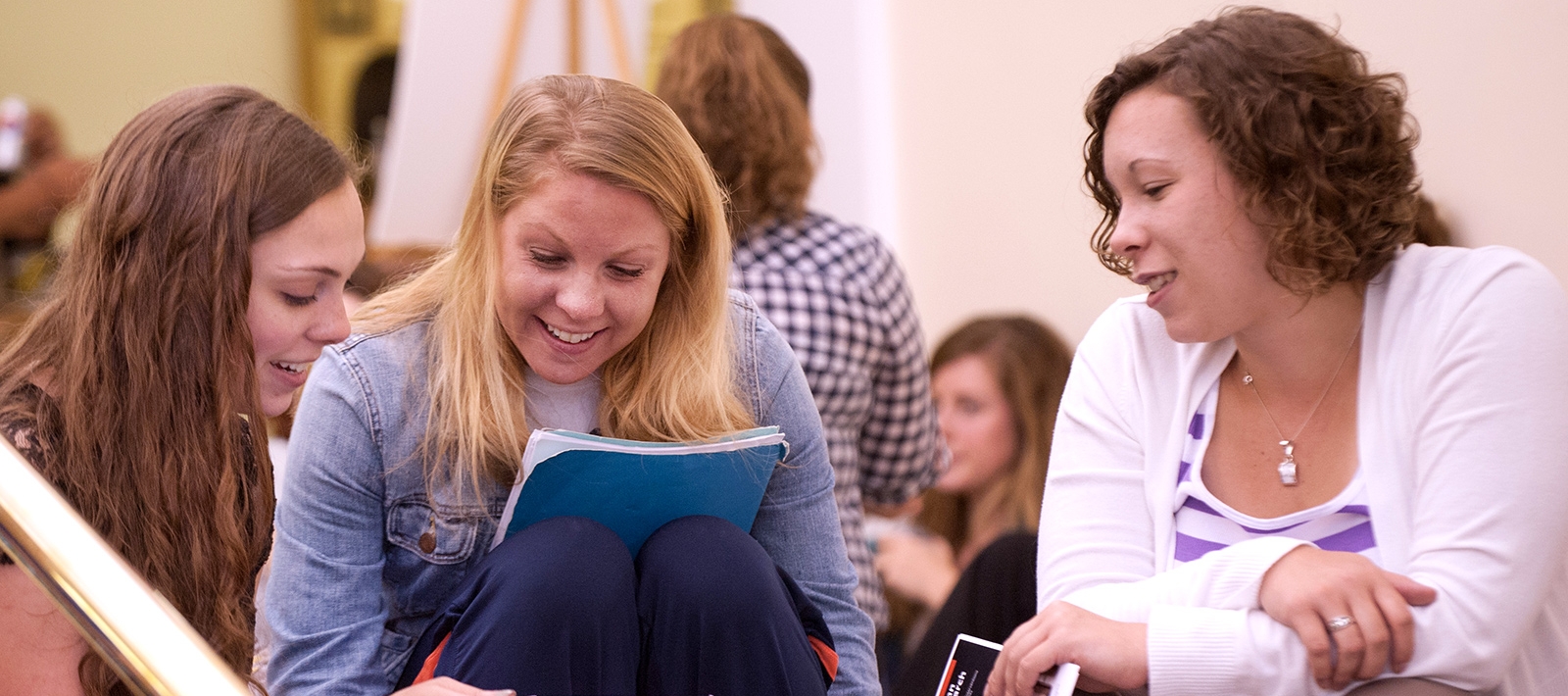 Graduate students attending a symposium