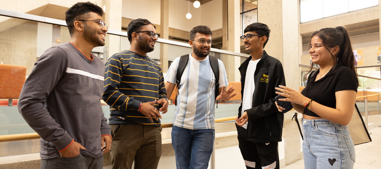 International students talking in Butler Library