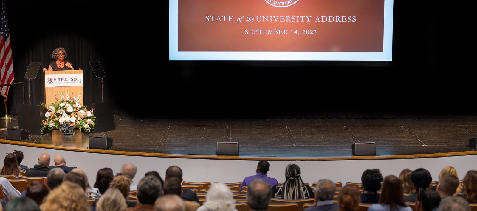 Buffalo State Interim President Bonita Durand at podium in front of audience