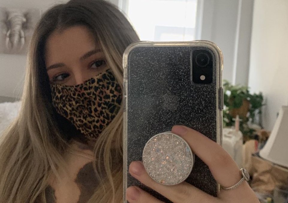 Selfie of Abigail Wetzler wearing a leopard-print mask