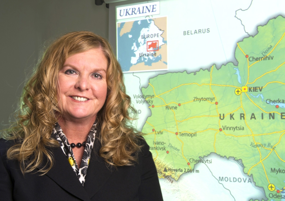 Kimberly A. Kline in front of map of Ukraine