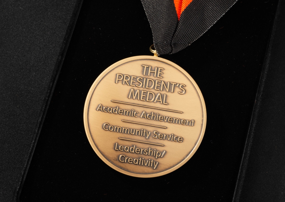 Obverse side of the President's Medal with the words Academic Achievement, Community Service, Leadership/Creativity